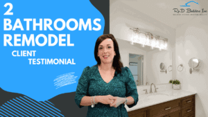 Client testimonial video thumbnail for a two-bathroom remodel featuring vanity with dark wood cabinets by RnD Builders Inc