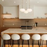 Warm Modern Kitchen with Flat-panel Oak Cabinets in Woodland Hills