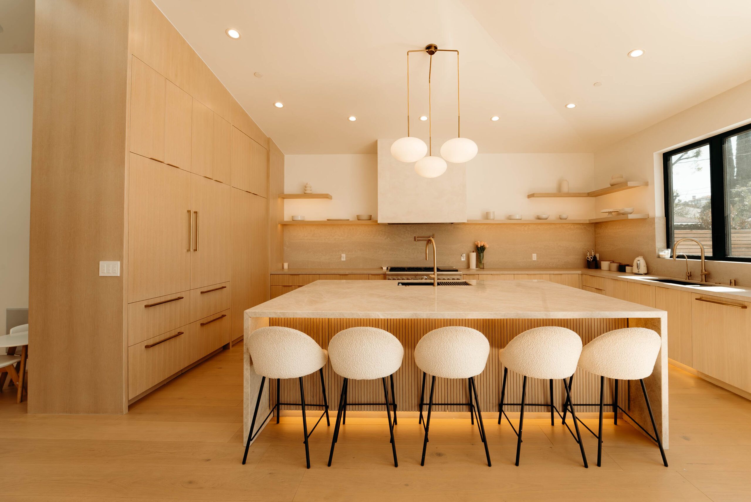 Modern Warm-toned Kitchen with Flat-panel Oak Cabinets in Woodland Hills