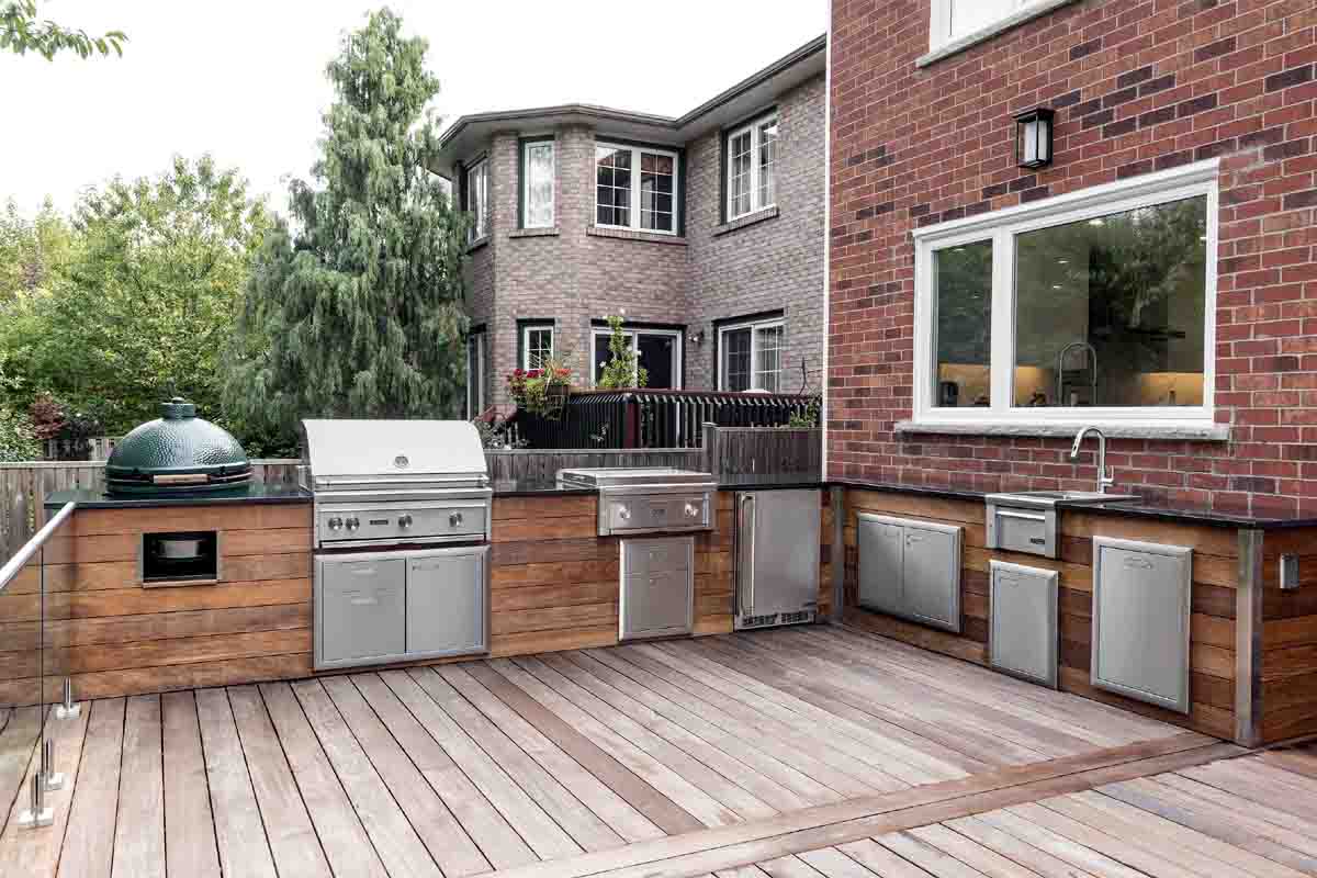 modern L-shaped outdoor kitchen design with grill and countertop