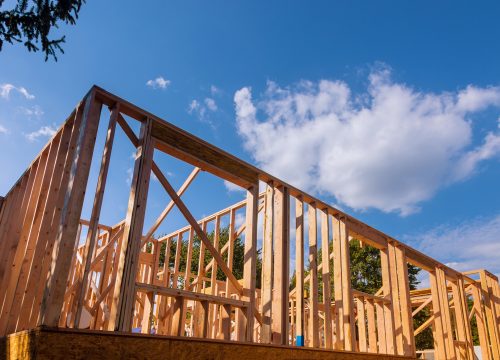 New framing construction home against a blue sky