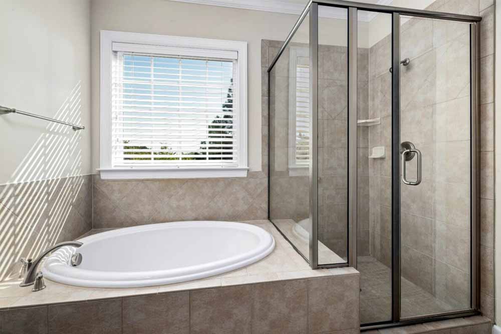 Jacuzzi bath remodel showing cost factors and installation process