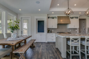 Farmhouse Kitchen with White Shaker Cabinets in Camarillo Choosing Remodel Materials That Survive Southern California: A Builder’s Guide to Flooring, Surfaces and Finishes