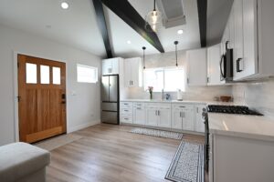 Farmhouse-style Kitchen with White Shaker Cabinets Modern ADU Interior Design Ideas To Upgrade Your Space