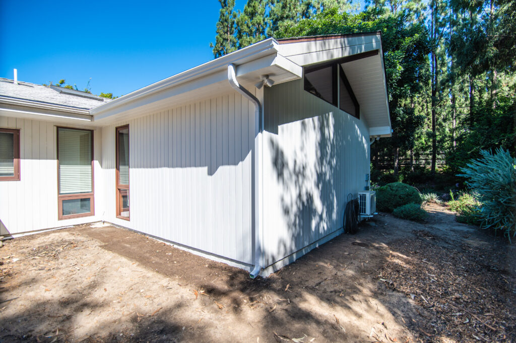 Exterior Home Addition with White Vertical Board-and-batten in Santa Rosa Valley Home remodeling contractor in Santa Rosa Valley: santa rosa valley home addition by RnD Builders