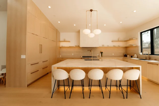 Modern Warm-toned Kitchen with Flat-panel Oak Cabinets in Woodland Hills
