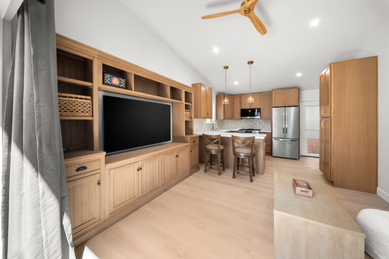 ADU Living Room and Kitchen Open Layout with built-in cabinetry, a ceiling fan, wide-plank flooring and an open kitchen in Simi Valley by RnD Builders Inc