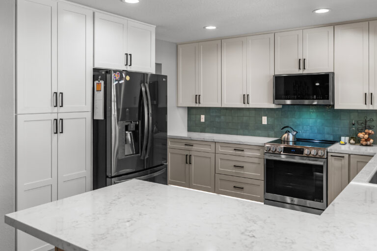 Peninsula, Range Wall and Pantry Cabinets with a peninsula countertop in Thousand Oaks by RnD Builders Inc