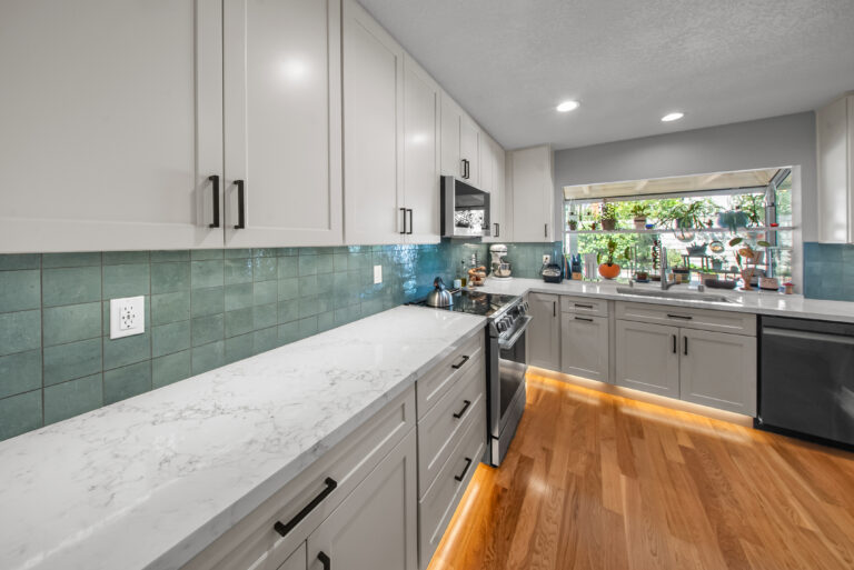 Countertop and Teal Tile Corner with a white countertop in Thousand Oaks by RnD Builders Inc