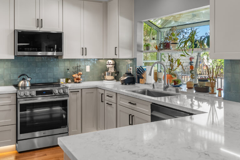 Range Wall and Peninsula Corner with a stainless range in Thousand Oaks by RnD Builders Inc