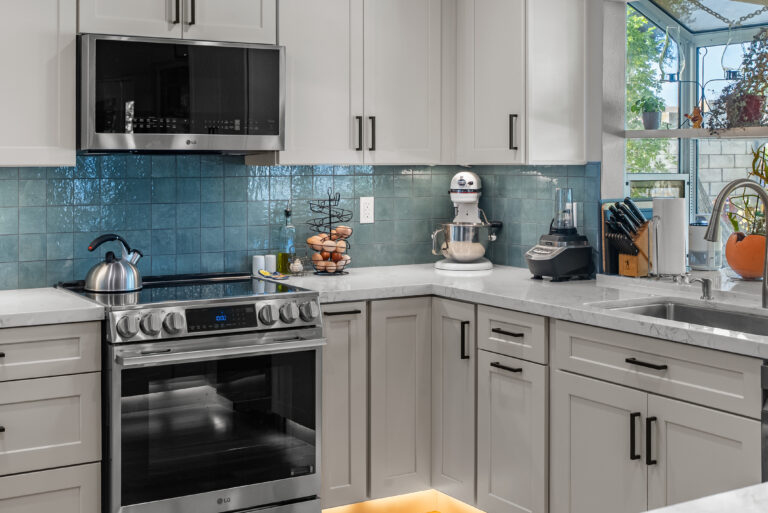 Range Corner with Drawer Base Cabinets with a stainless range in Thousand Oaks by RnD Builders Inc