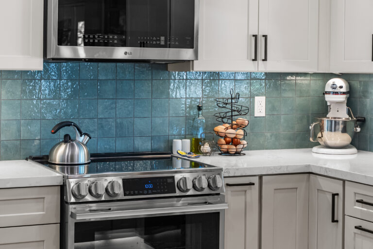 Thousand Oaks kitchen remodel: Teal Glazed Tile Behind the Range in Thousand Oaks by RnD Builders Inc