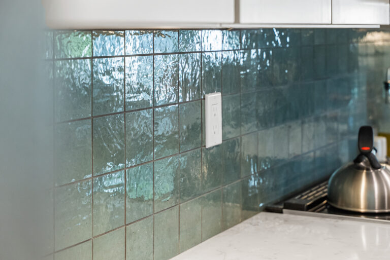 Teal Tile and Countertop Detail with glazed teal tile in Thousand Oaks by RnD Builders Inc