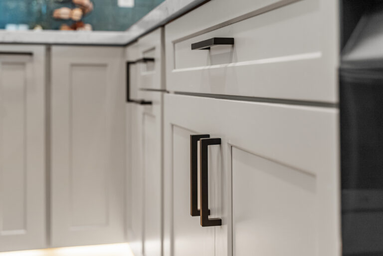 Shaker Cabinet Door with Black Pull with a gray shaker cabinet door in Thousand Oaks by RnD Builders Inc