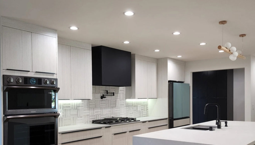 Modern Kitchen with Light Wood-grain Flat-panel Cabinets in West Hills Home remodeling contractor in Northridge: west hills home remodel by RnD Builders